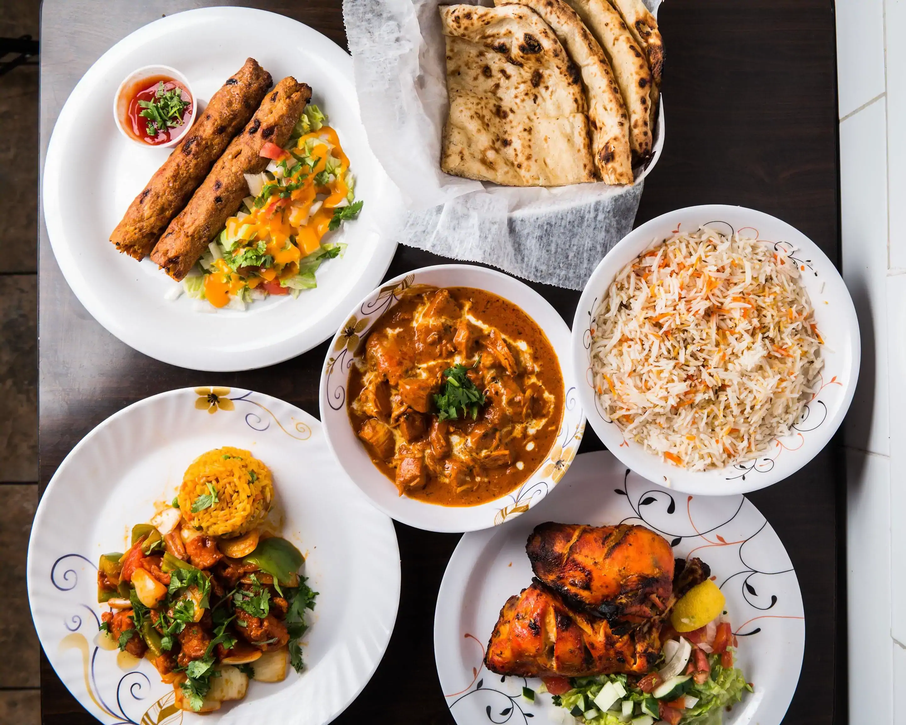 Fresh Indian appetizers including Samosas and Papri Chaat at Punjabi Feast Indian restaurant Winnipeg
